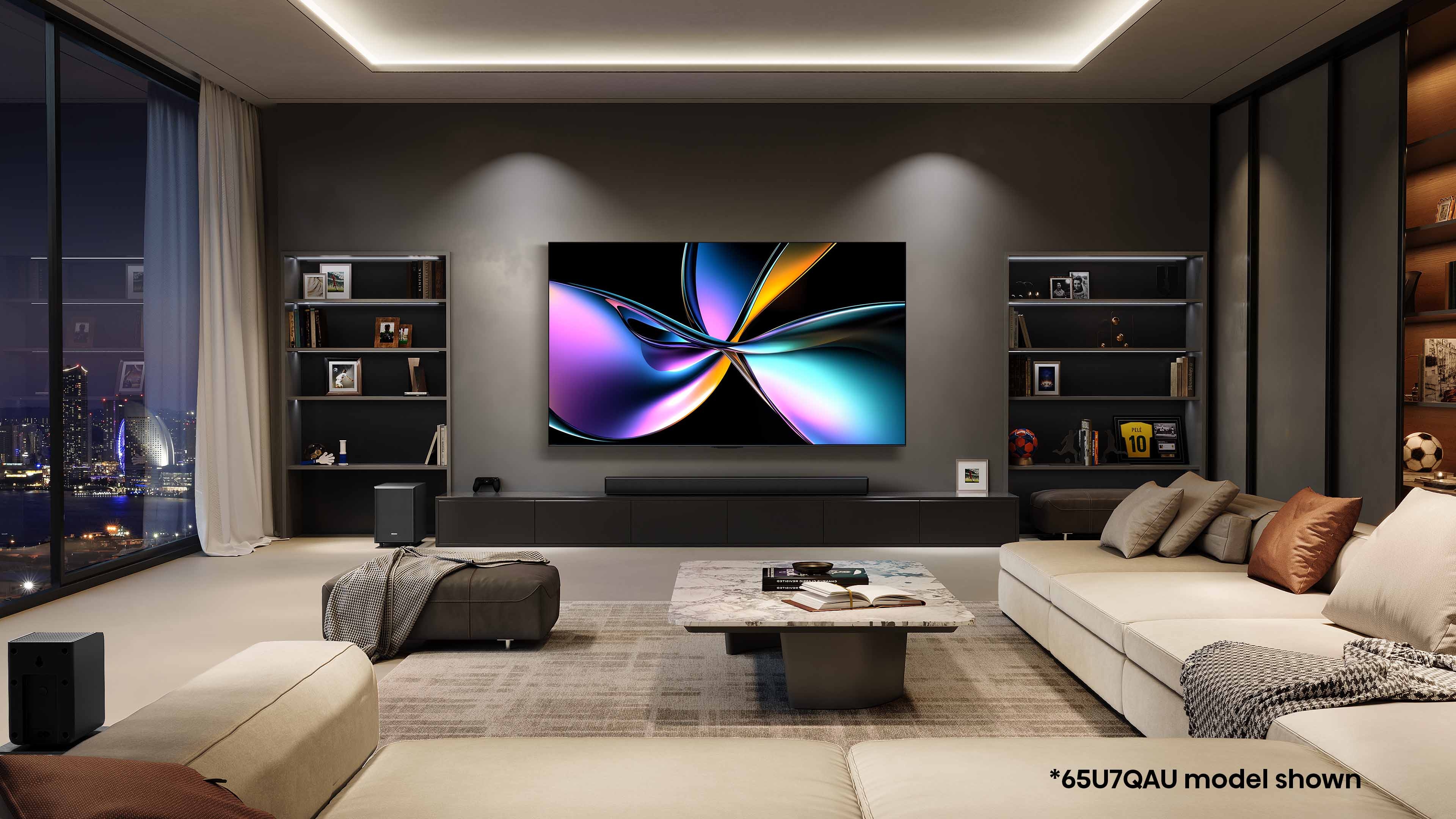 A modern living room features a large flat-screen TV with vibrant abstract display, sleek furniture, and floor-to-ceiling windows showcasing a city view