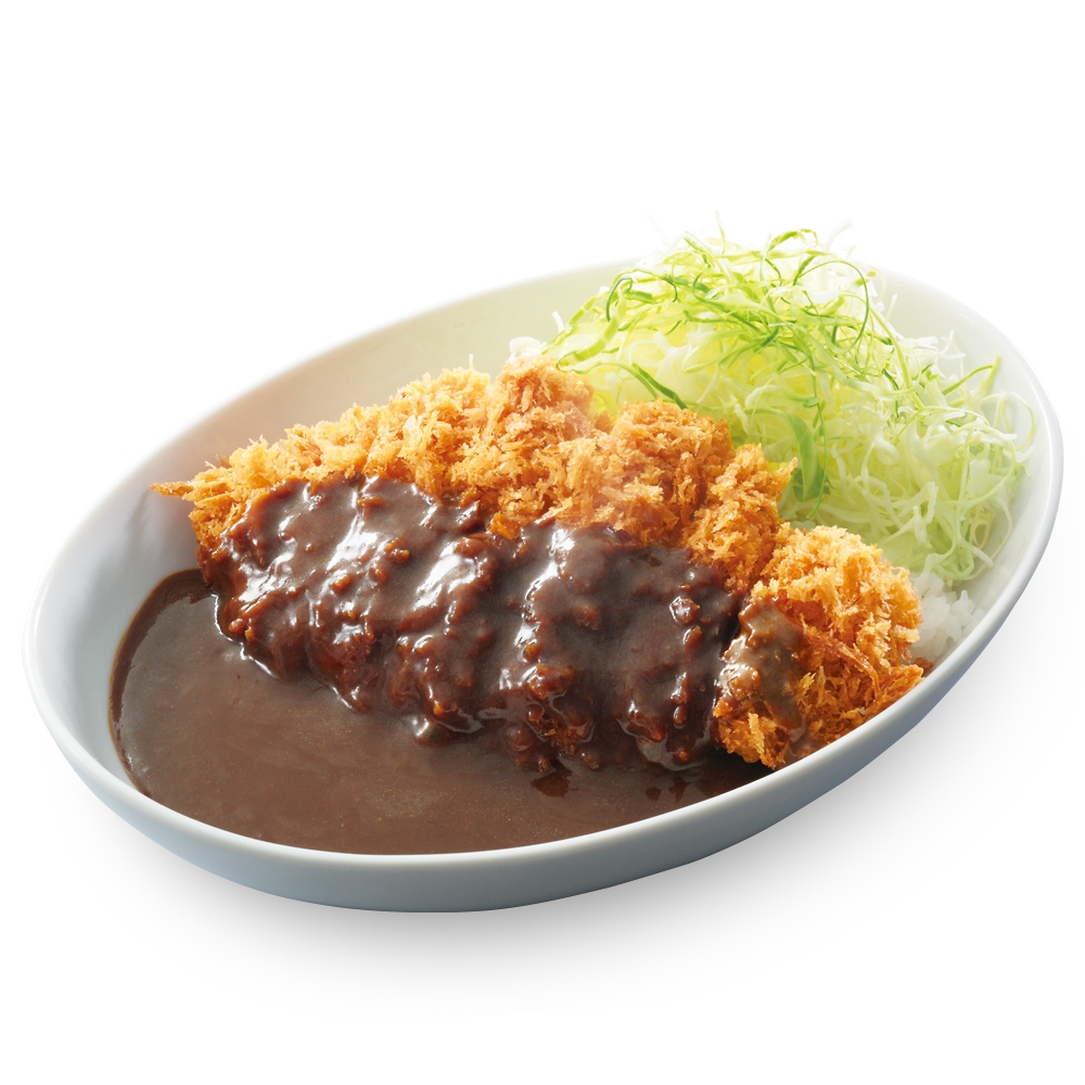 皿に盛られたカツカレー。カツにはカレーソースがかかり、隣に千切りキャベツが添えられている。