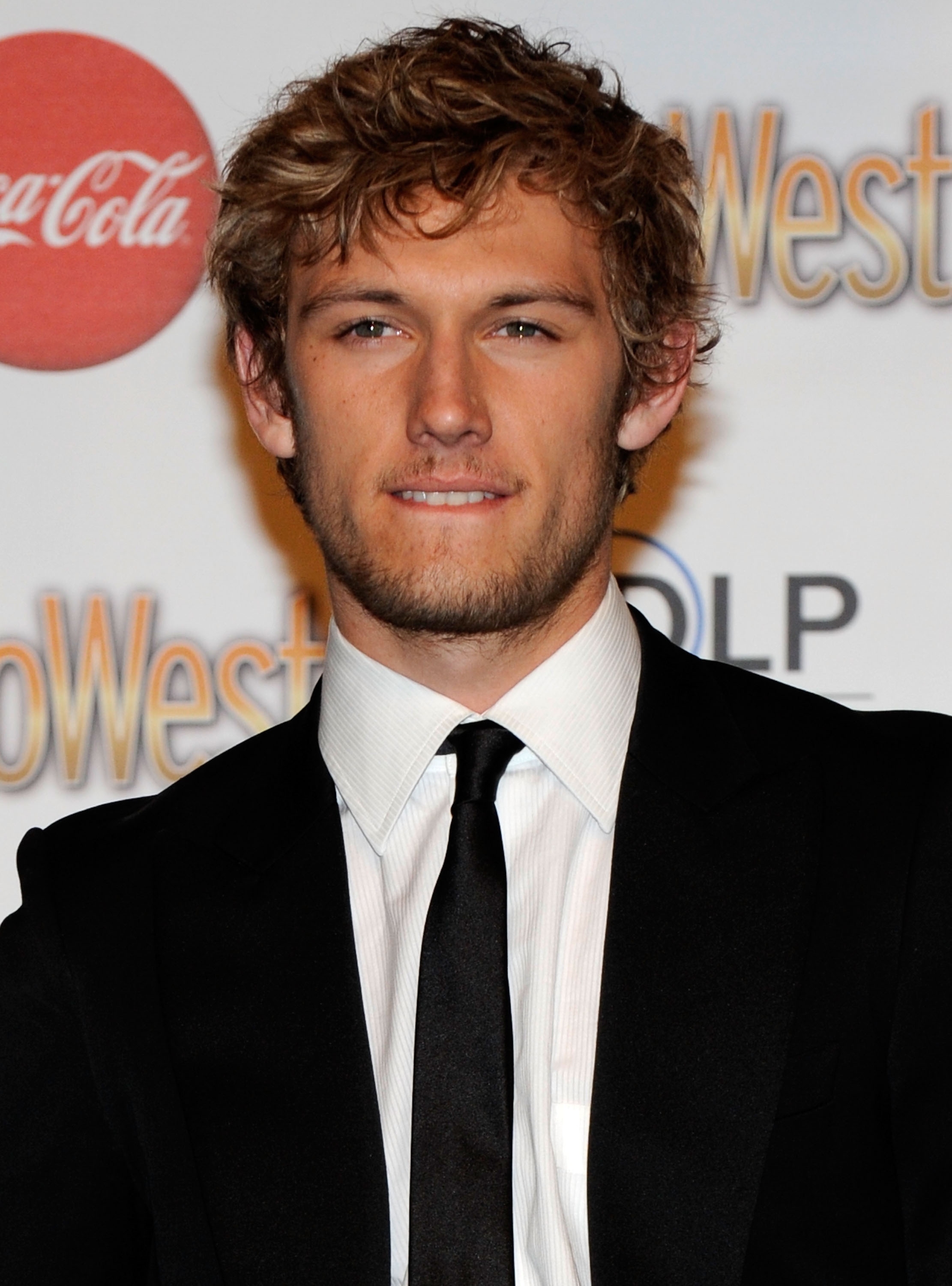 Alex Pettyfer at a formal event