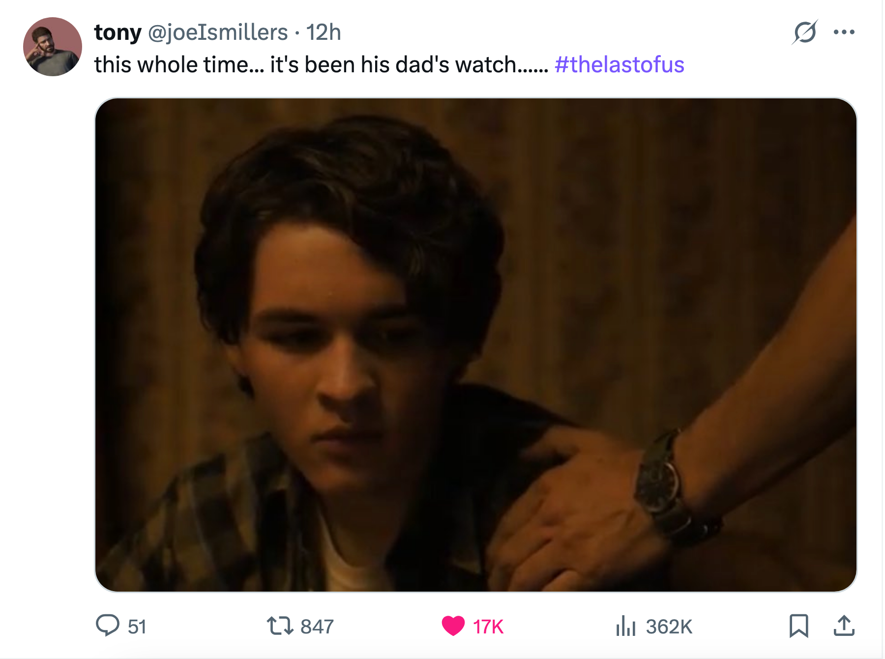 A photo of Joel's dad's hand on his shoulder, showing the watch, with someone pointing out that it's Joel's watch
