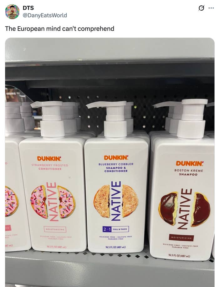 Three shampoo and conditioner bottles with Dunkin' flavors: Strawberry Frosted, Blueberry Cobbler, and Boston Kreme
