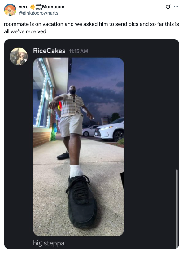 Person mimicking a giant stepping, shot from low angle, on a sidewalk at night, with cars in the background. Social media post captioned: "big steppa."