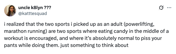 Tweet humorously observes that powerlifting and marathon running encourage candy consumption and can involve accidental urination during workouts