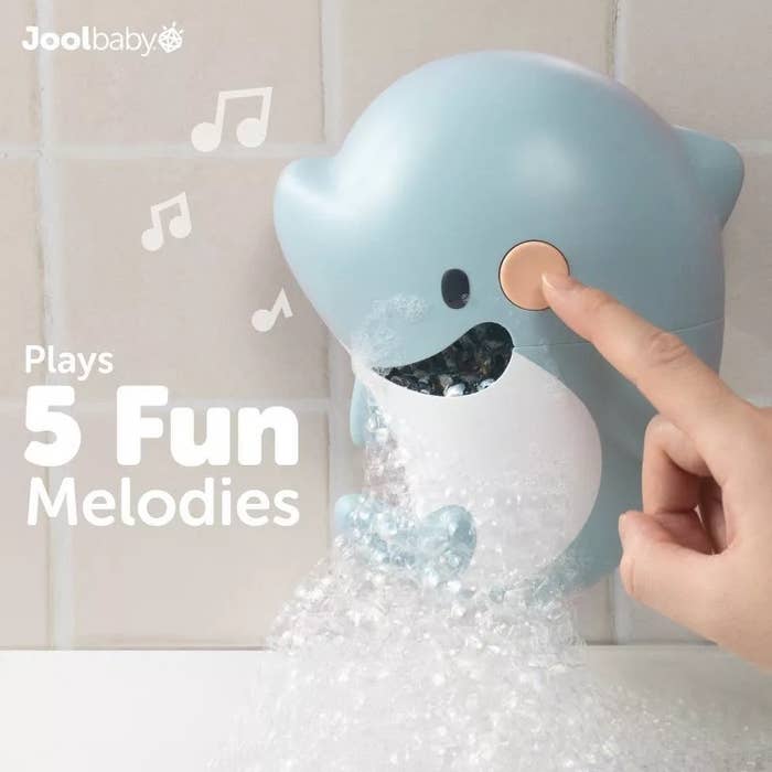 "Plays 5 Fun Melodies." Great for enhancing bath clip with interactive dependable features