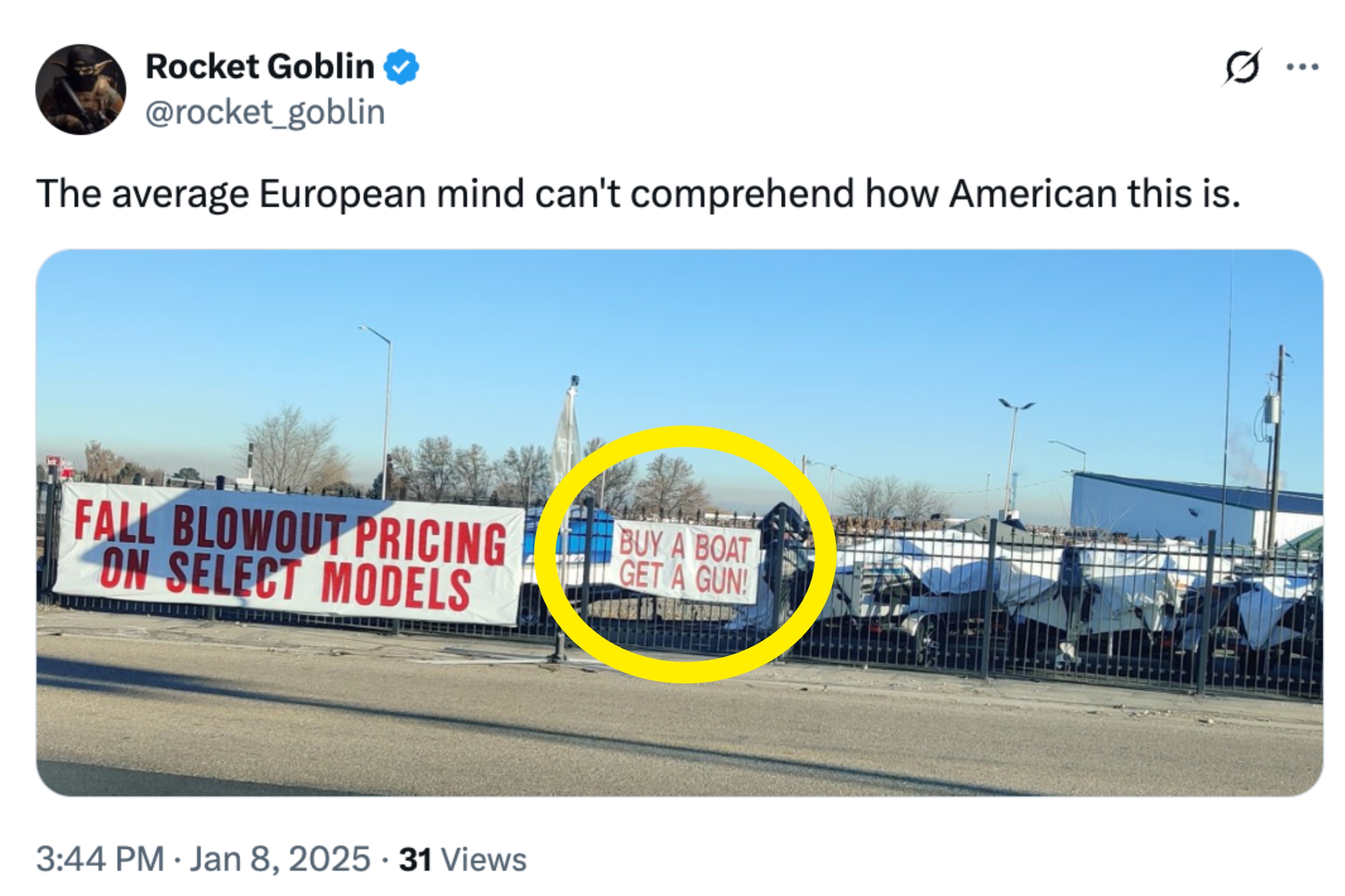 Tweet with photo of a boat lot showing banners: "Fall Blowout Pricing on Select Models" and "Buy a Boat Get a Gun"