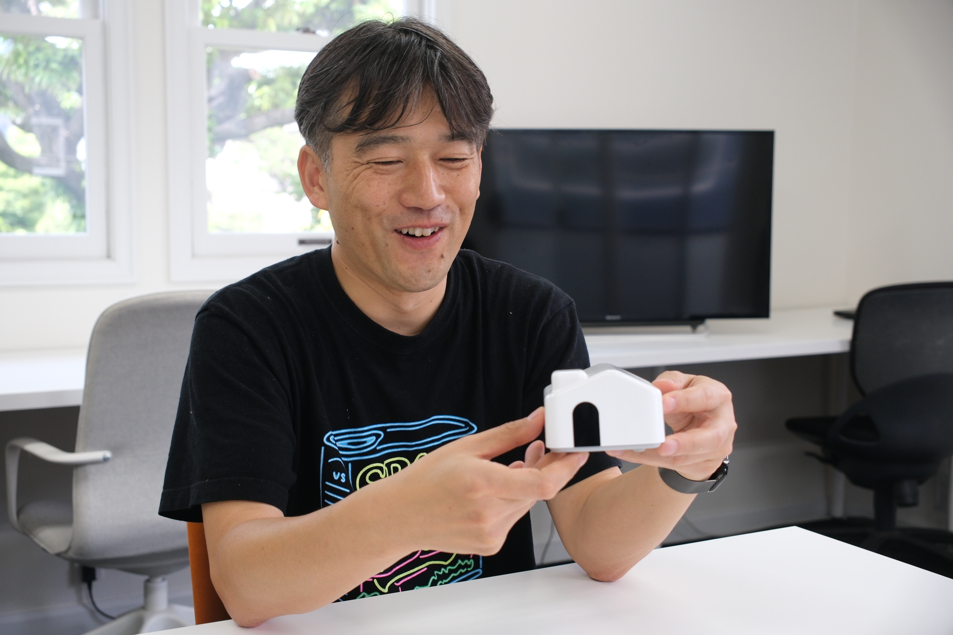 インタビューに応じる梶原健司さん