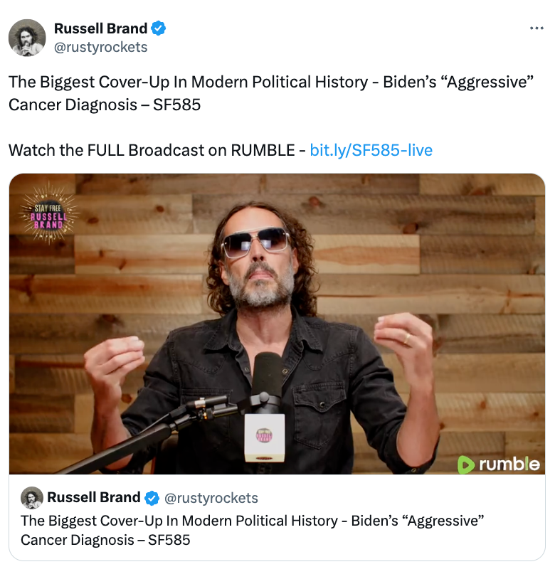 Man with sunglasses gestures while sitting at a table with a microphone. Text discusses a broadcast about a political cover-up and a cancer diagnosis