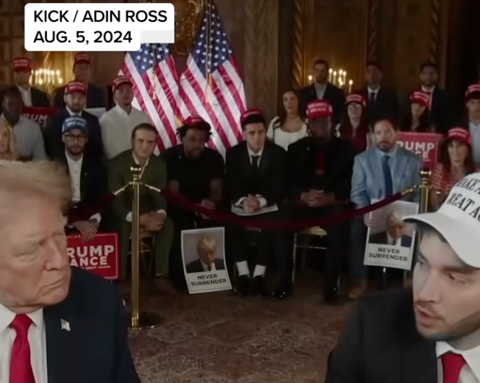 Group of people, some wearing promotional hats, sitting indoors at an event with U.S. flags. Date and names displayed: Aug. 5, 2024, Kick/Adin Ross