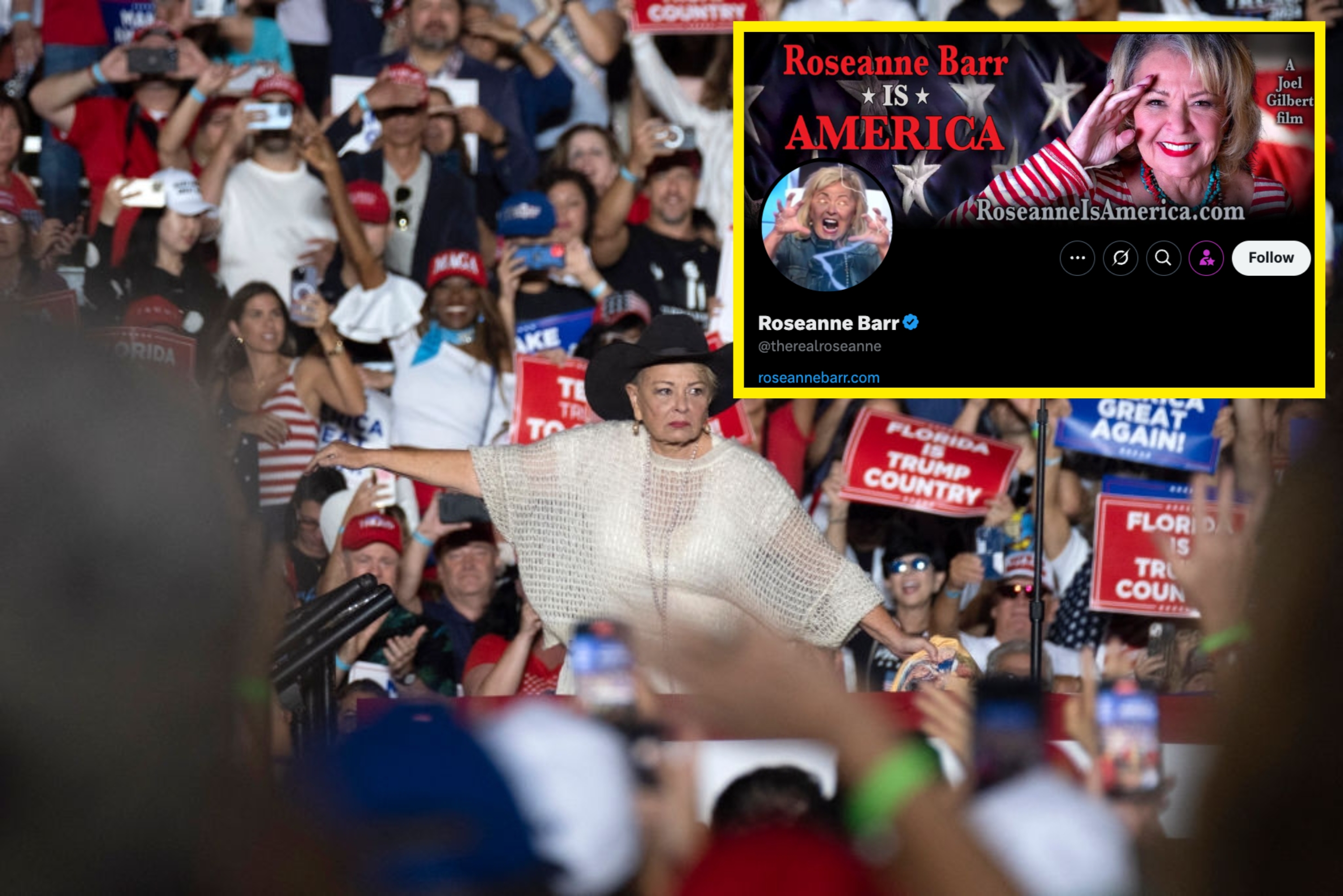 Woman in a wide-brimmed hat on stage, arms outstretched, with a crowd holding political signs in the background