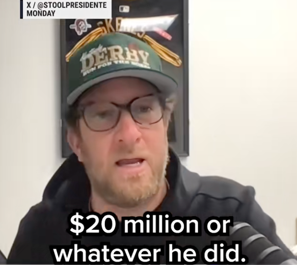Person in cap and glasses speaking, with caption: "$20 million or whatever he did."