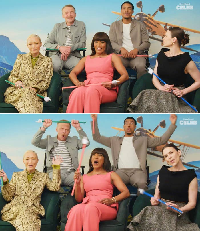 Simon, Tarzan, Pom, Angela, and Hayley cheering during an interview and smiling