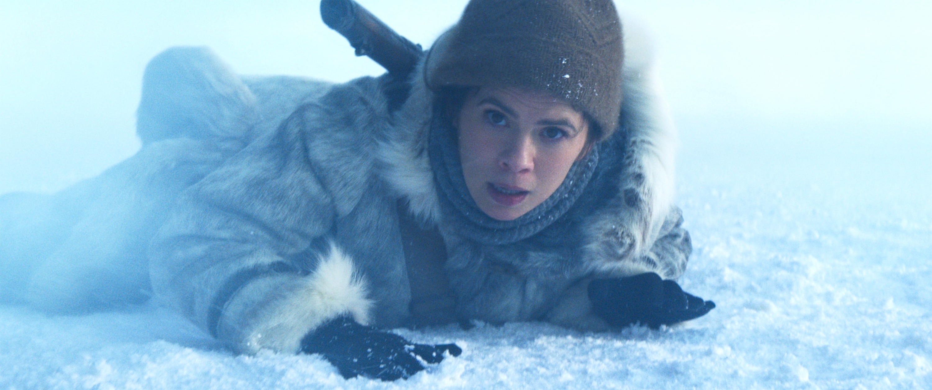 Hayley Atwell as Grace laying in the snow in a scene from "The Final Recknoning?