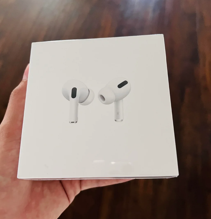 Reddit post showing a box of new AirPods Pro with the caption "New airpod pros just arrived!" on a tech subreddit page