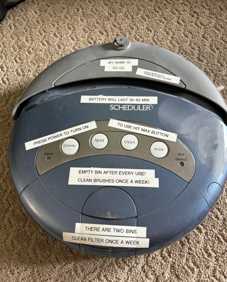 Reddit page featuring a meme about a vacuum cleaner with humorous labels. The meme discusses the longevity and maintenance of the vacuum