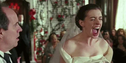 Bride in a wedding dress, yelling joyfully at the altar, surrounded by guests