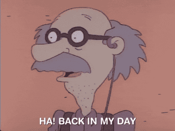 Animated elderly man with glasses and mustache says, "Ha! Back in my day," appearing amused