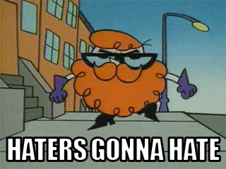Cartoon character with sunglasses struts confidently on the street. Text reads "HATERS GONNA HATE."