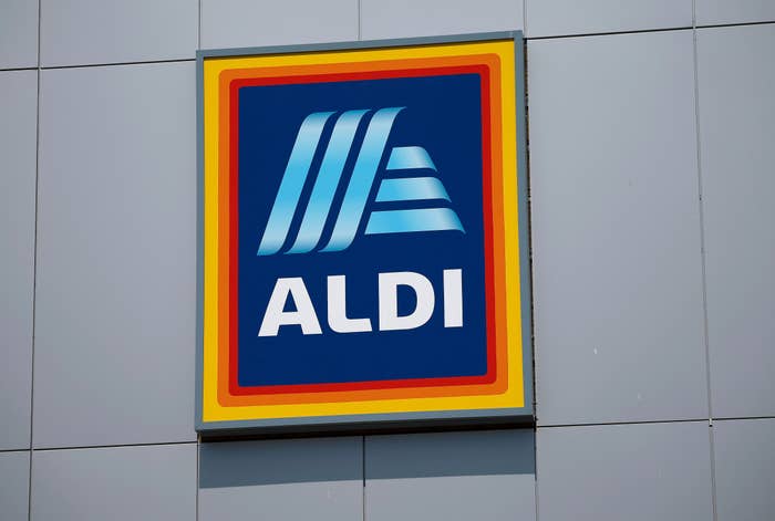 Aldi supermarket logo displayed connected a gathering exterior