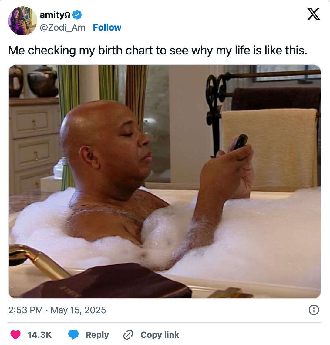 Person relaxing in a bubble bath, looking at a phone. Caption says, "Me checking my birth chart to see why my life is like this."