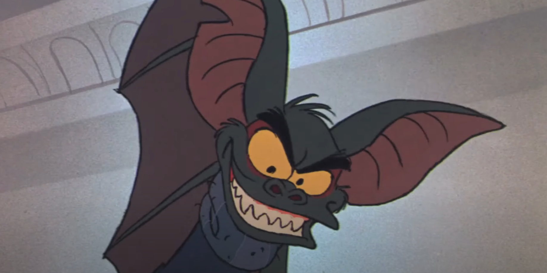 Animated bat with large ears and sharp teeth grinning mischievously in a cartoon style