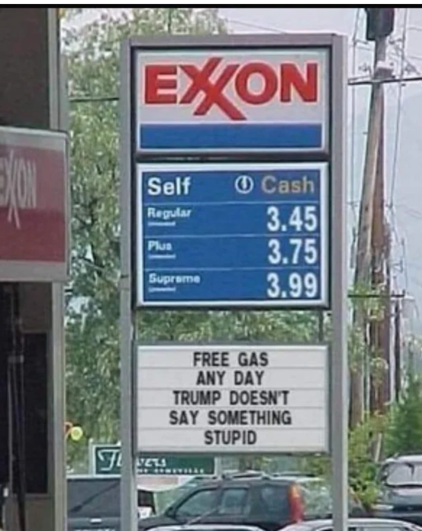Gas station sign shows prices and reads: "Free gas any day Trump doesn't say something stupid."