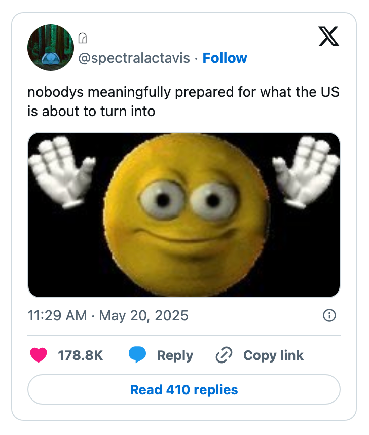 Tweet with an animated waving yellow smiley face and text: "nobodys meaningfully prepared for what the US is about to turn into."