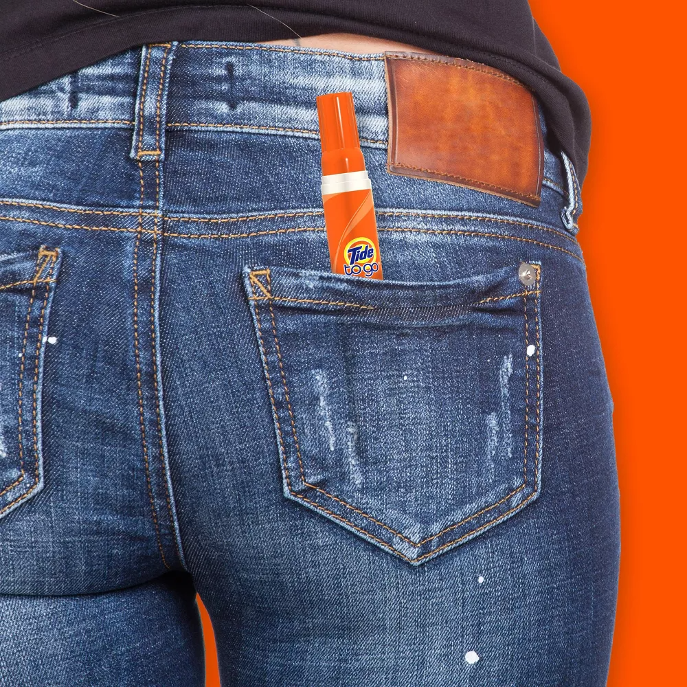 Tide To Go pen in back pocket of distressed jeans, ready for on-the-go stain removal