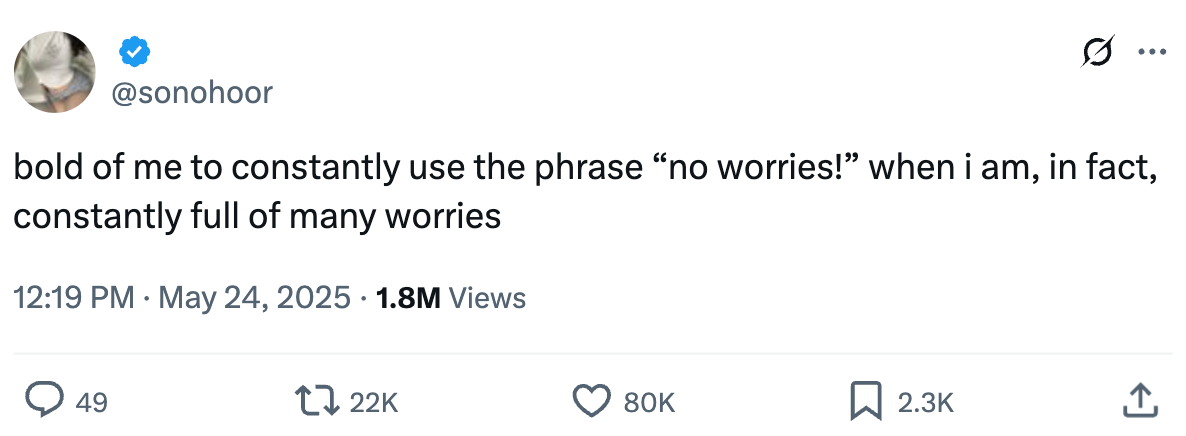 Tweet expresses irony in using "no worries" despite having many worries