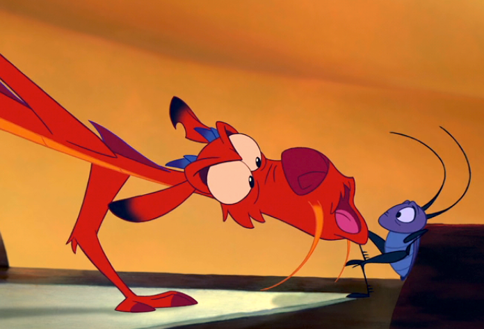 Animated dragon Mushu and cricket Cri-Kee from "Mulan" in a humorous, intense exchange