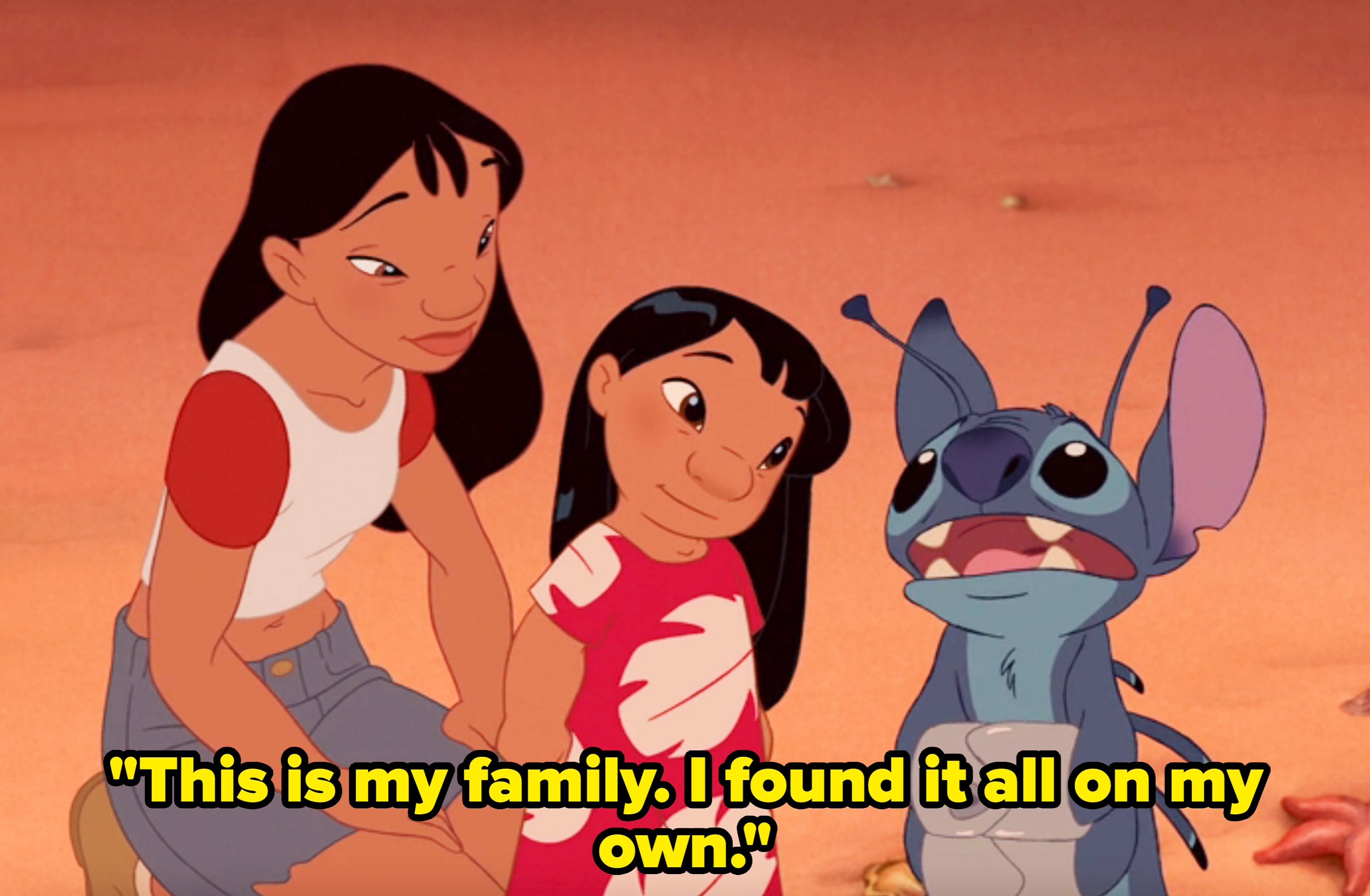 Lilo, Nani, and Stitch sit together on a beach. Text reads: "This is my family. I found it all on my own."