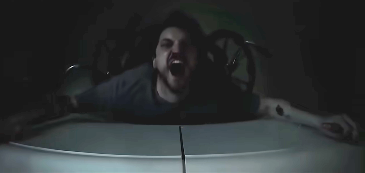 A frightened man is lying on his back, seemingly pulled toward a dark space, arms outstretched. The text reads "Final Destination Bloodlines."