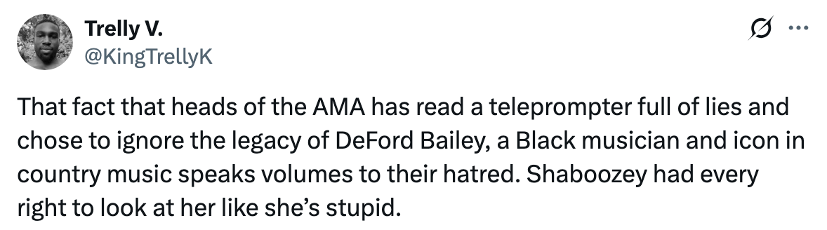 Tweet criticizing the AMA for ignoring DeFord Bailey, a Black musician, highlighting past and ongoing racial issues in country music