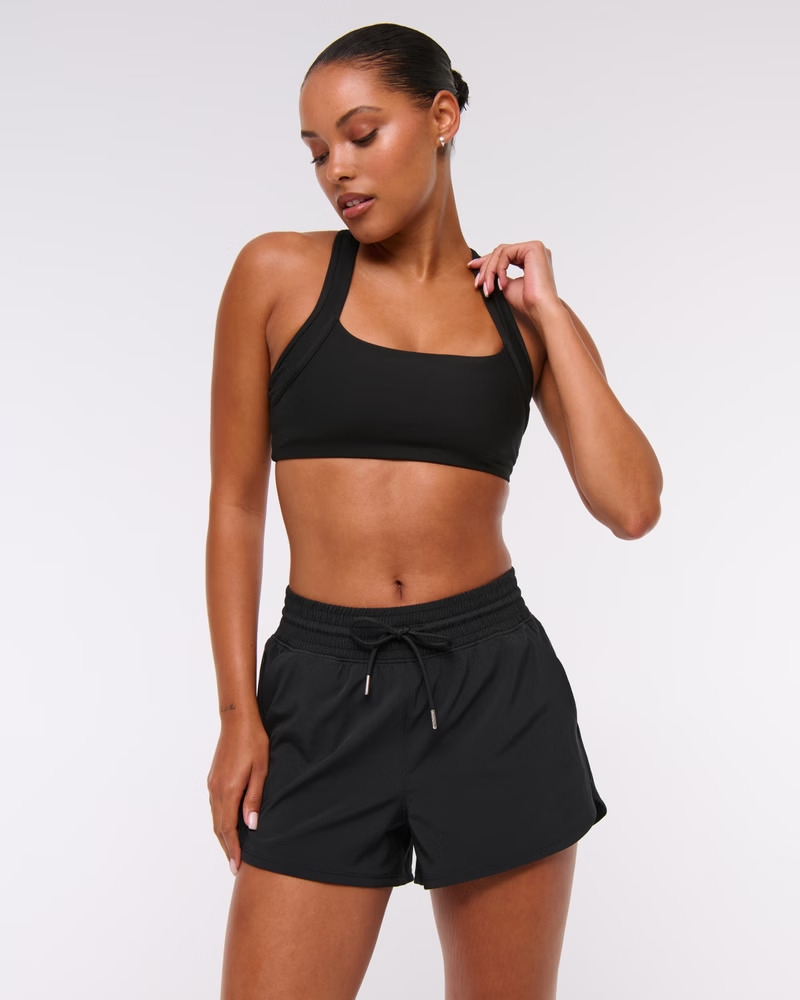 Model wearing the black shorts