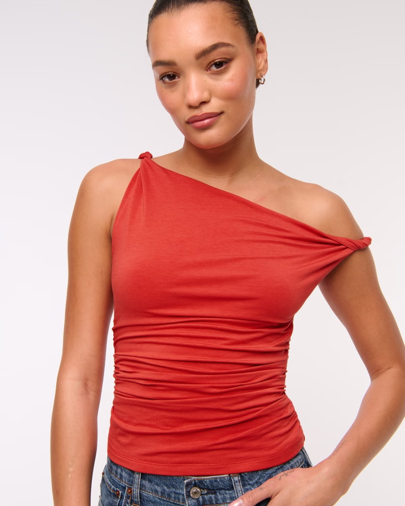 Model wearing the red top