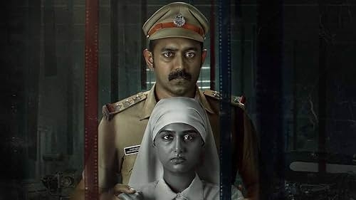 A police officer stands behind a woman in a nun's habit, holding a black and white photo of her. The setting is dark and serious