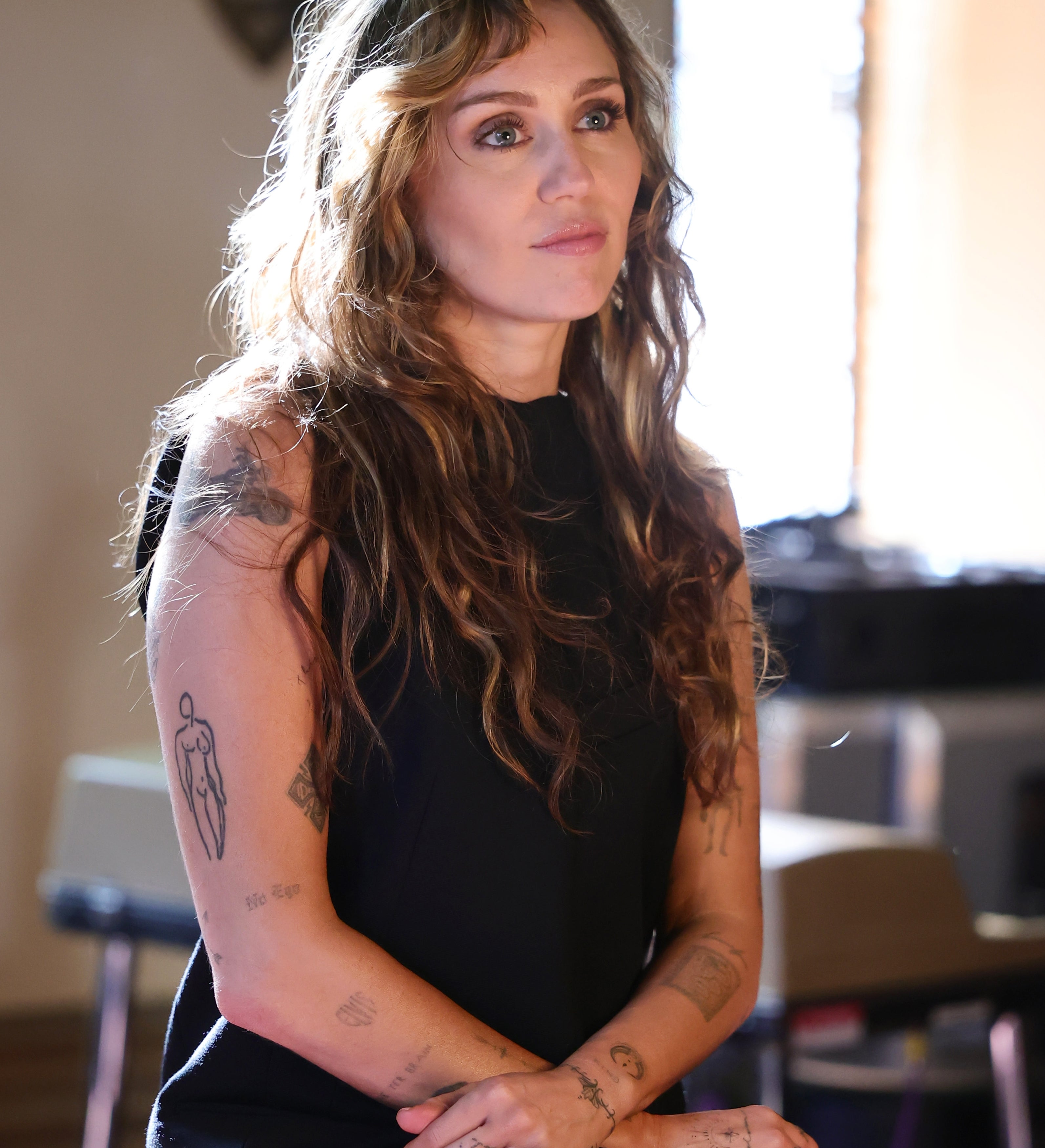 Miley Cyrus Jokes Her Bangerz Era Was a 'System Malfunction' During D23  Speech | Teen Vogue, image size:3186x3500