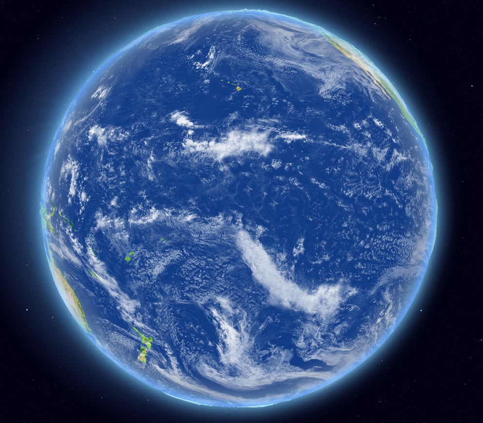 View of Earth from space, showing oceans and clouds covering most of the surface, with some land visible