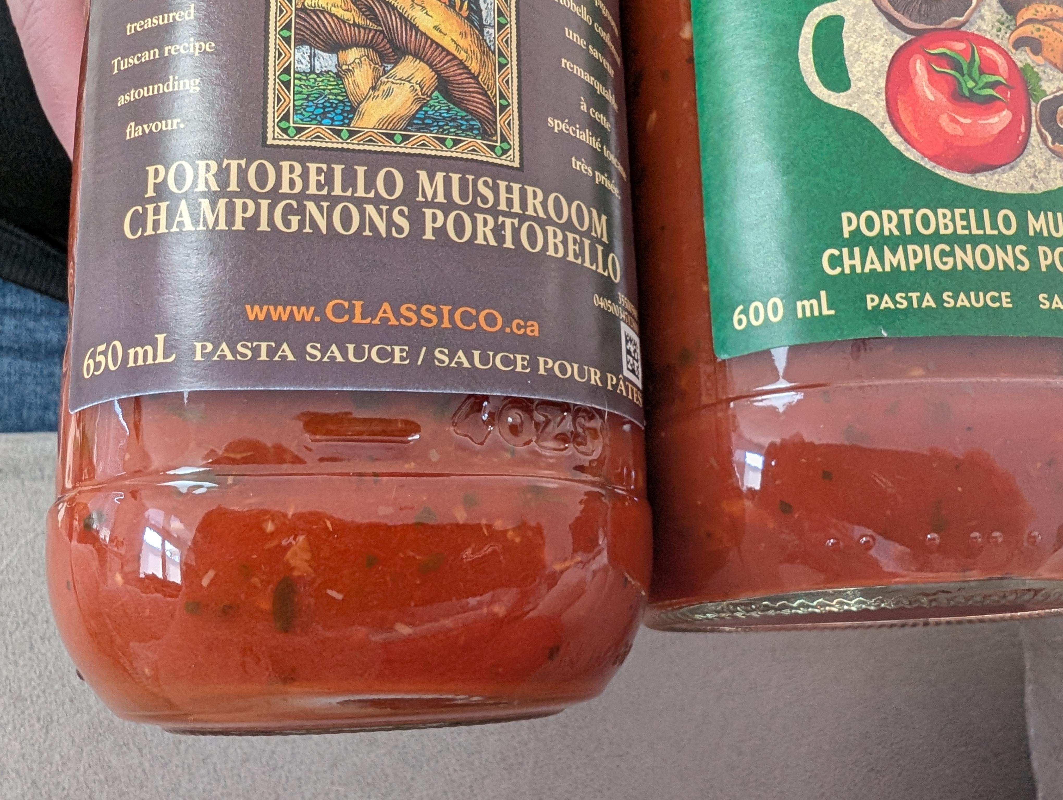 Two jars of Classico portobello mushroom pasta sauce compared side by side, showing different bottle volumes: 650ml and 600ml