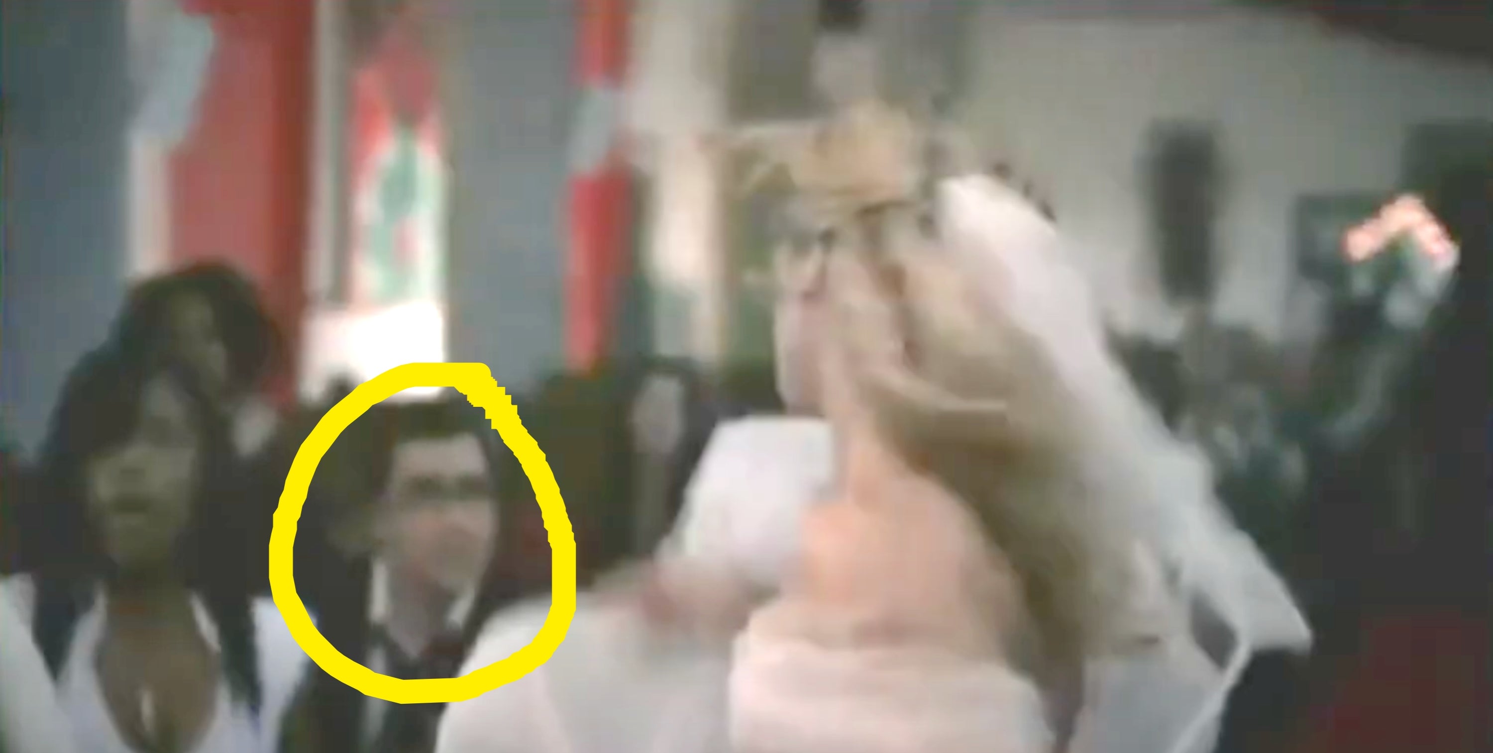 Person in a wedding dress running down an aisle, with guests in the background reacting with surprise