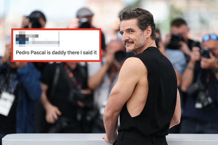 Actor in a sleeveless black top poses confidently while photographers capture the moment at a press event