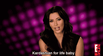 Person speaking with &quot;Kardashian for life baby&quot; text and E! Online logo