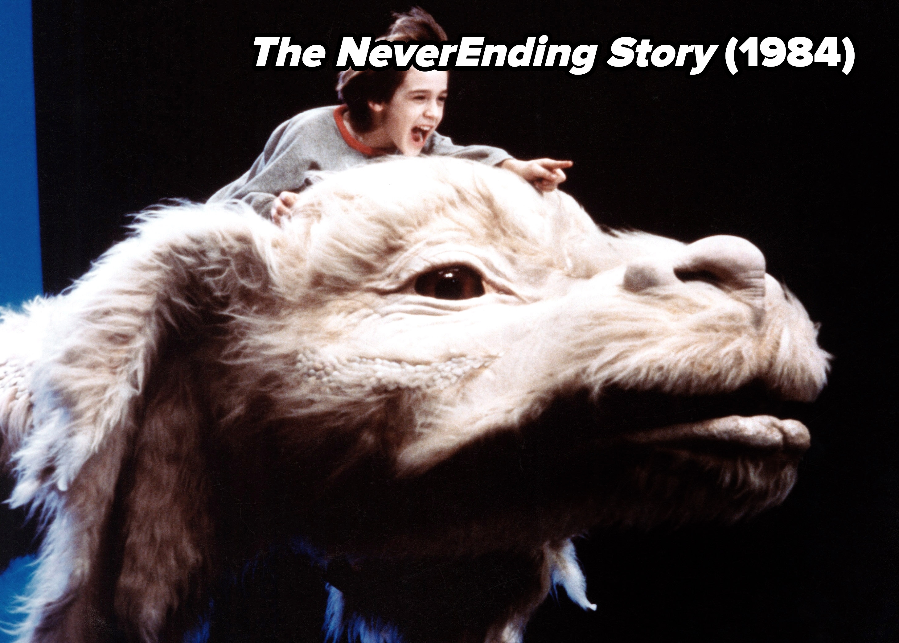 Child riding a large, furry creature, appearing joyful and imaginative, reminiscent of a fantasy adventure scene