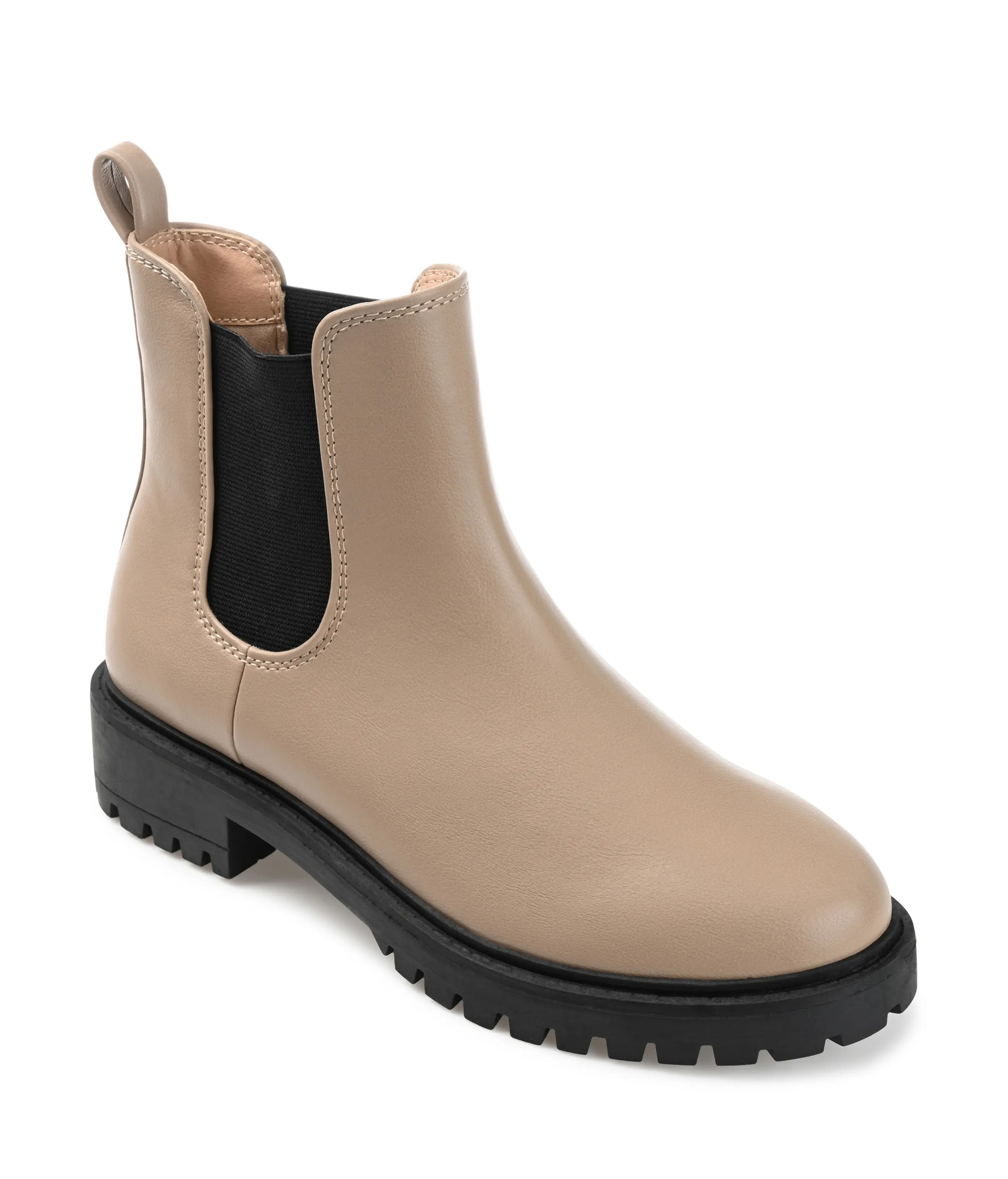 A chunky-soled Chelsea boot with side elastic panels and a pull tab, perfect for stylish and practical footwear choices