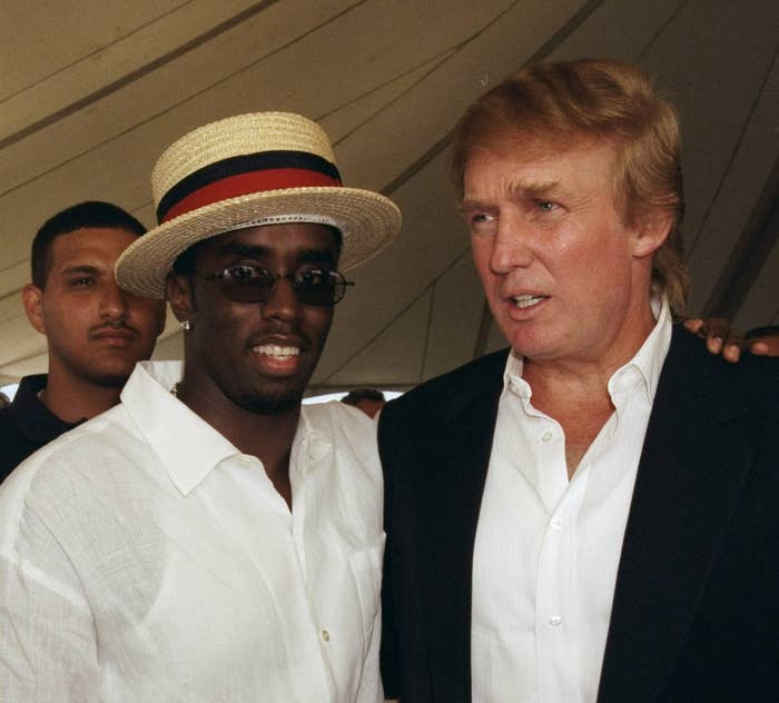 Diddy and Trump standing together at an event, one wearing a straw hat and casual attire, the other in a blazer and open-collared shirt