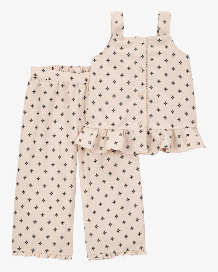 Sleeveless apical  and pants with a ruffled hem and prima  pattern, suitable for casual wear