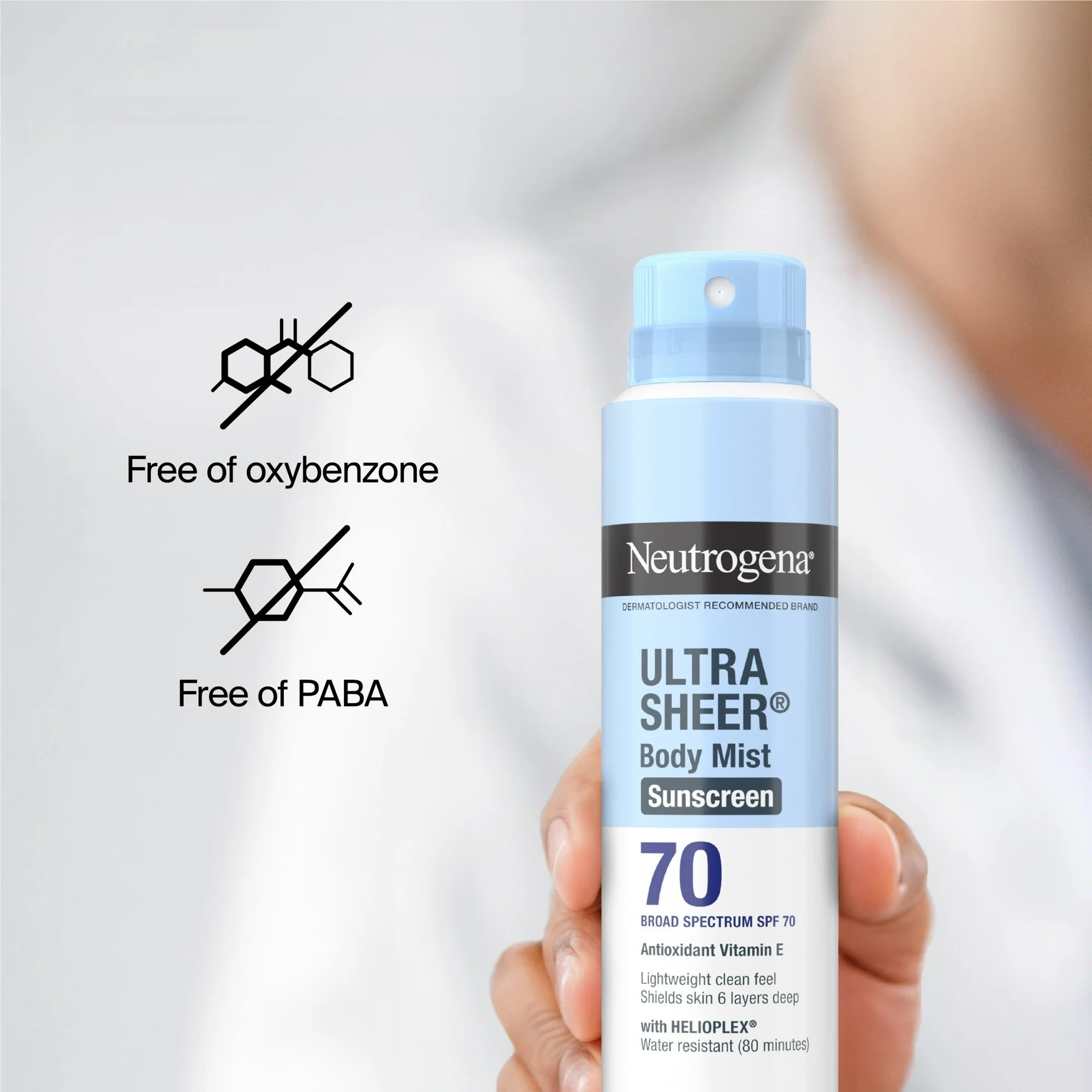 Neutrogena Ultra Sheer sunscreen spray vessel  held successful  hand, labeled SPF 70; substance   highlights it is escaped  of oxybenzone and PABA