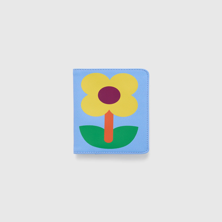 Passport holder with a simple flower design, featuring a yellow flower with a red center and green leaves