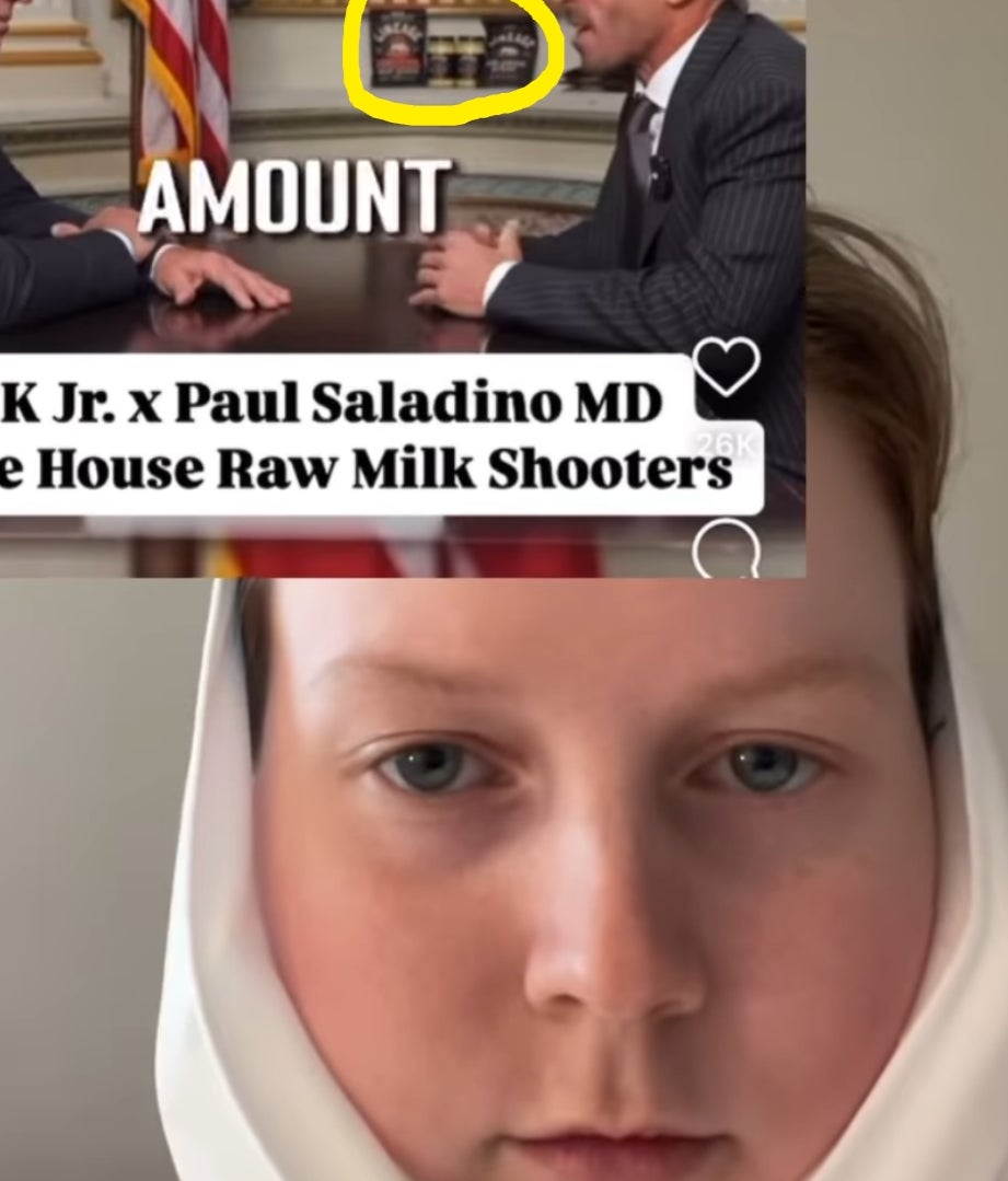 Two men are sitting at a table in a formal setting with wellness product jars displayed. A comment highlights concerns about profit over health