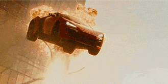 A sports car jumps between skyscrapers through explosions, evoking a thrilling action scene from a movie