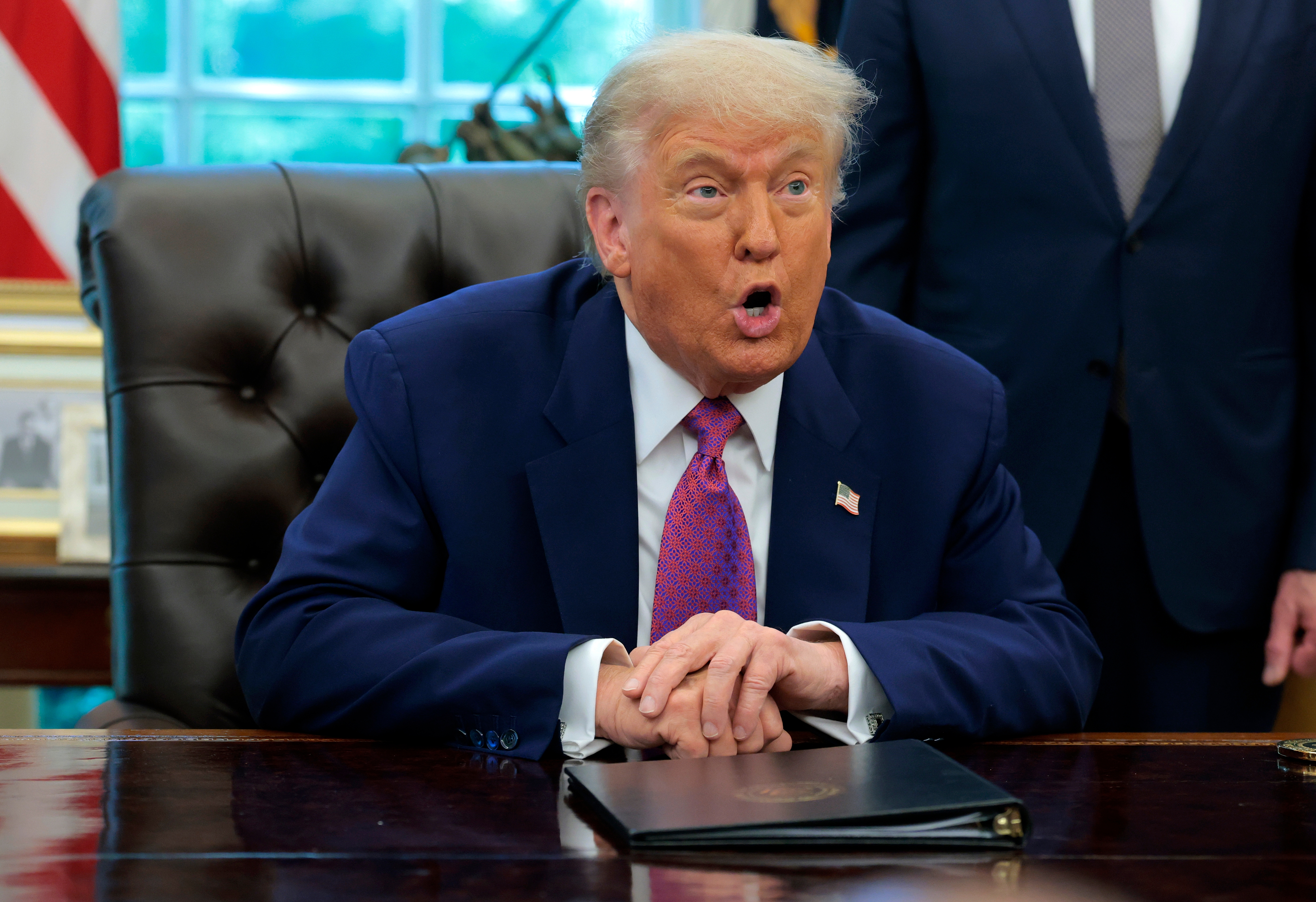 Donald Trump delivers remarks on natural disaster preparedness in the Oval Office at the White House